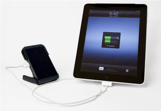 Waka Waka Power charging a tablet